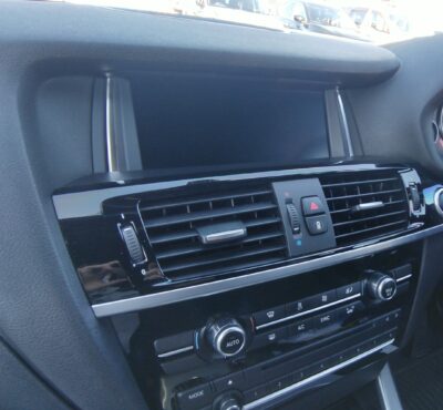 Stock navigation monitor on a BMW X3 F25