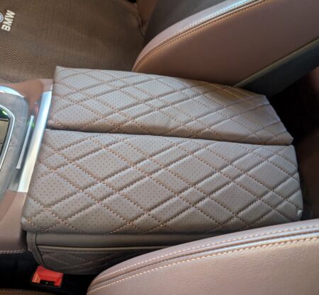 The AliExpress armrest cover installed on the G05 X5