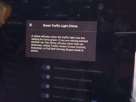 Green Traffic Light Chime explanation dialog on the car screen