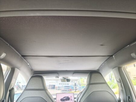 Tesla Model YL headliner with the roof sunshade fitted