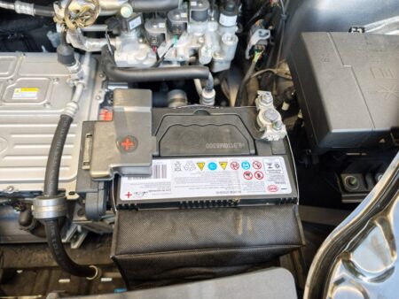 The 38B20L lead-acid battery in the BYD ATTO 3 engine bay