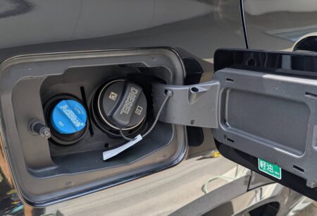 Fuel flap with the black diesel cap next to the blue AdBlue cap