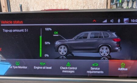 Vehicle status after the refill showing top-up amount 5 litres