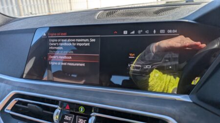 iDrive showing Engine oil level above maximum