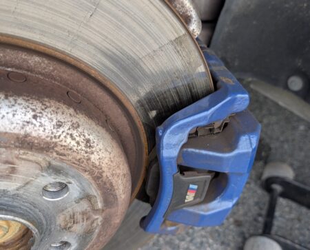 Front brake disc showing a lip worn at the outer edge
