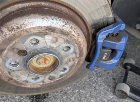 Rear brake disc with surface rust plus a worn edge