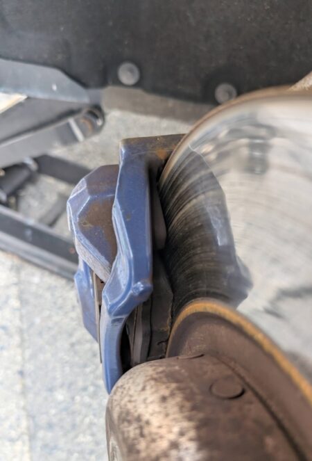 Impact wrench loosening the wheel bolts