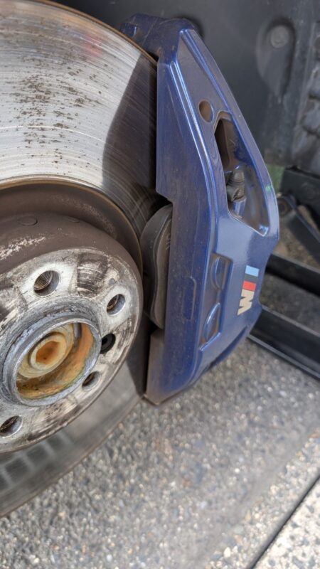 Rear blue caliper with the M badge