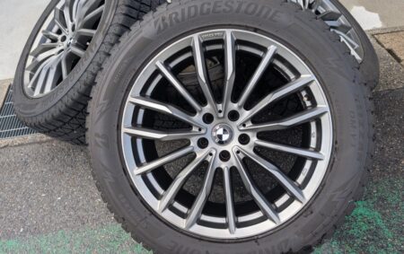 Bridgestone Blizzak DM-V3 winter tyres on 19-inch wheels after removal
