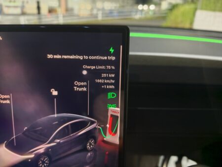 Model YL charging at a Supercharger with 251 kW showing on screen