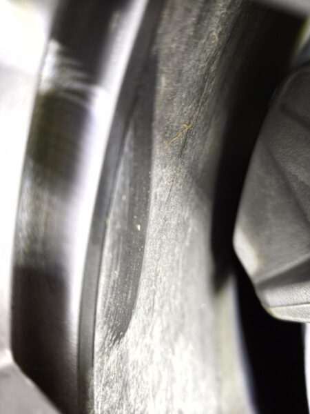 Clearance gap at the Model YL rim inner wall beside the brake caliper