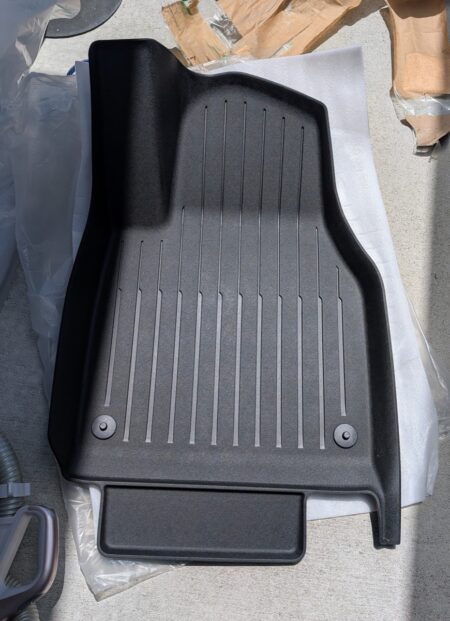 The TPE tray mat for the front footwell, unpacked