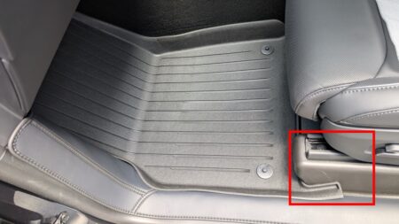 The red box marks the TPE guard covering the step under the seat rails