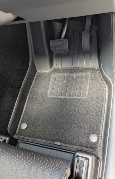The driver's side carpet mat fitted