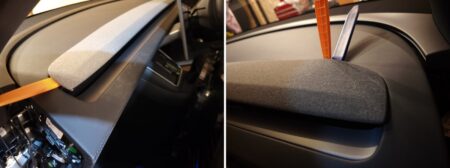 Flat trim tool pushed into the gap of the top dash cover