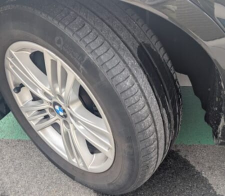 The wet tyre tread, with the problem hidden somewhere in the photo