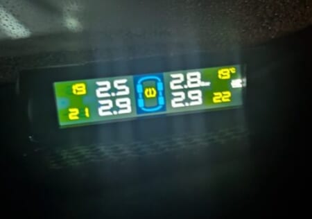 The TPMS display on the dashboard, visible from the driver's seat