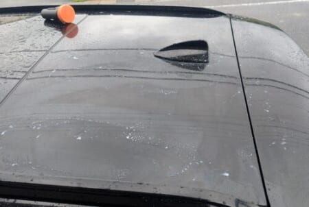 Polishing the roof with the cordless polisher