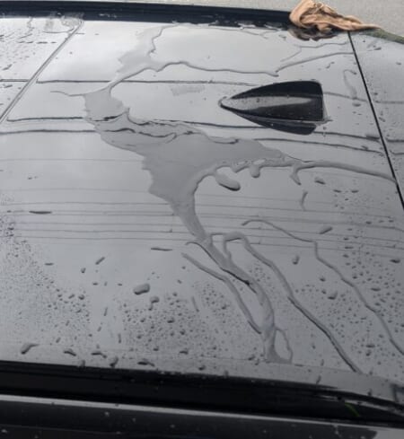 Water beading tightly on the polished roof