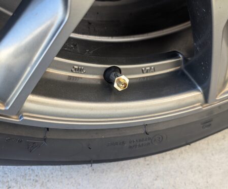 The lock ring threaded onto the valve stem