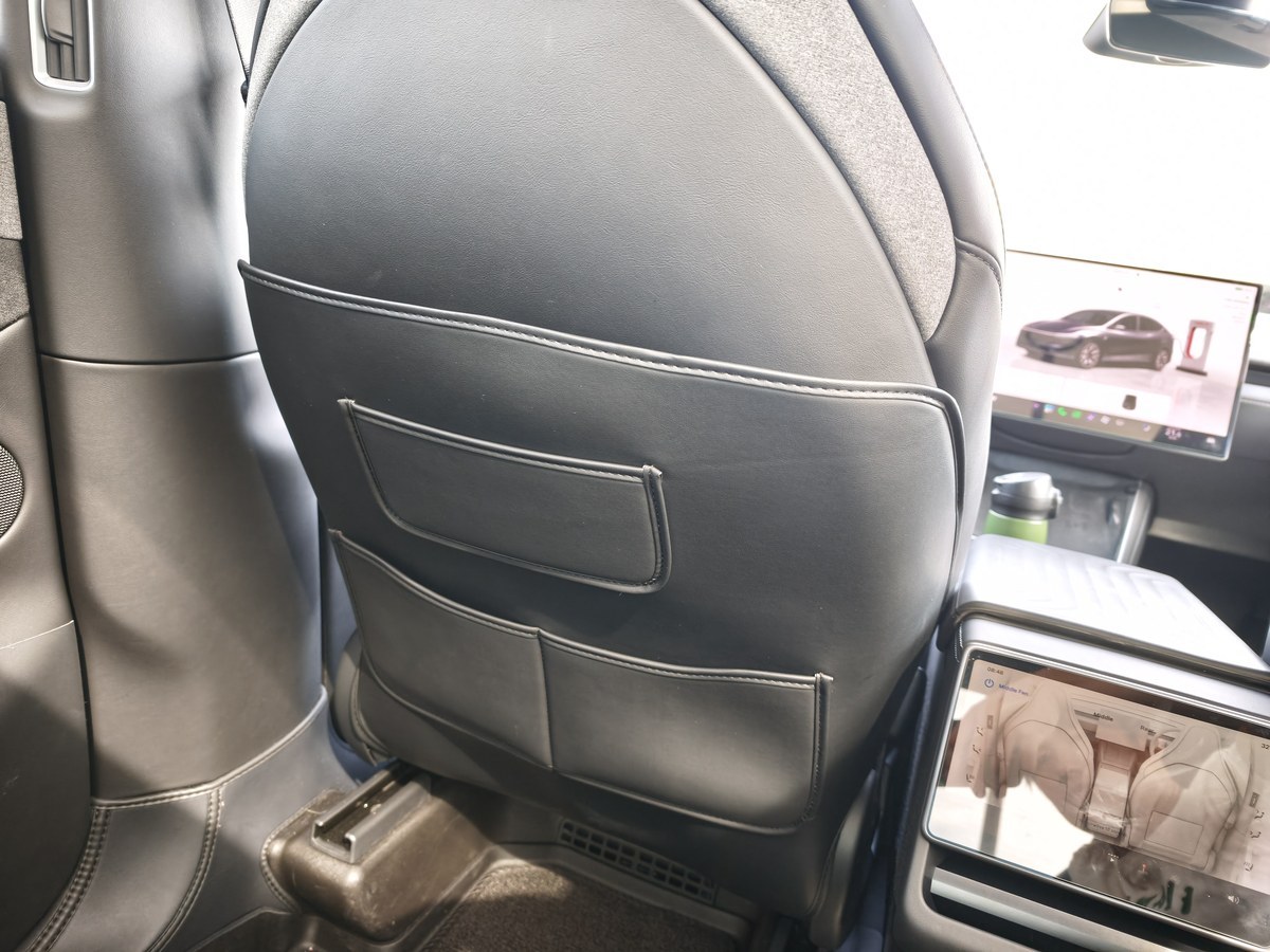 Kick guard fitted to the back of the Model YL driver seat