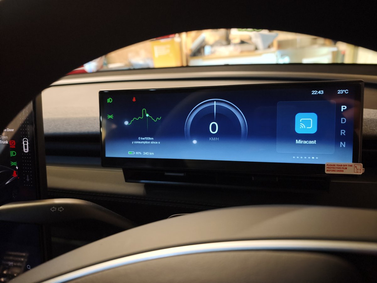 Dashboard display fitted behind the steering wheel of a Model YL