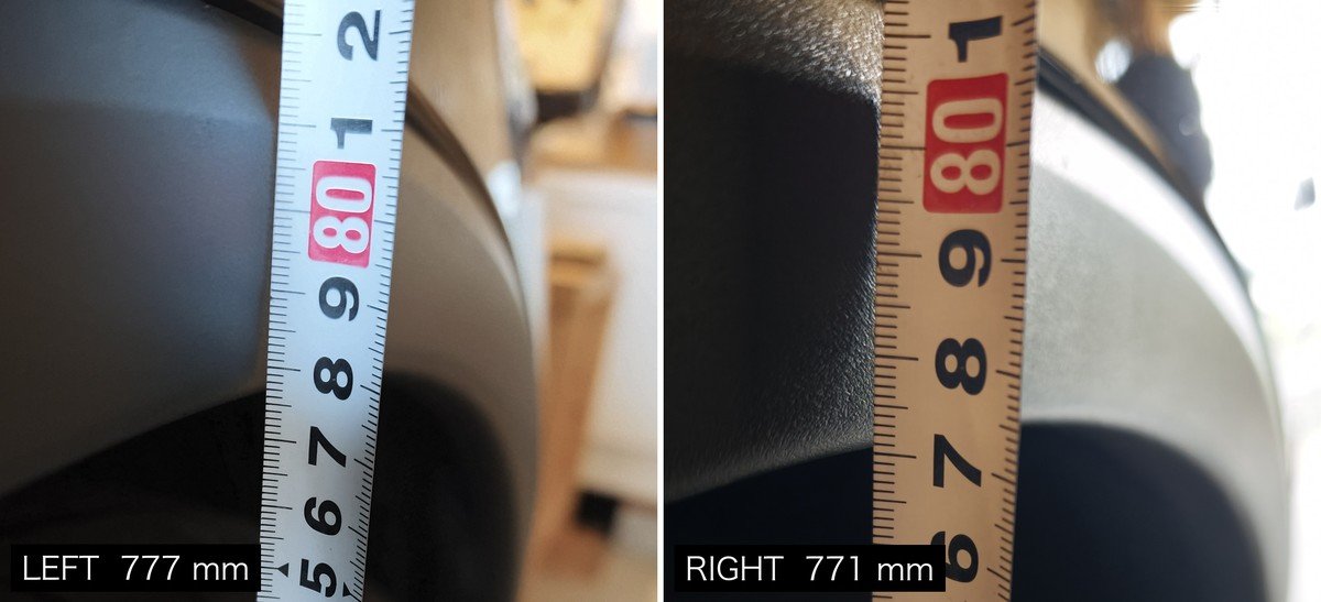 Tape measure scale read at the gap above the rear tyre on both sides