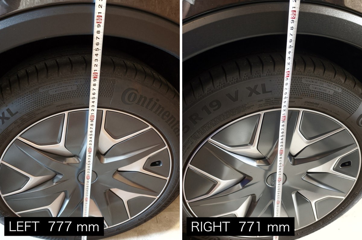 Model YL rear wheels measured from the ground with a tape measure, left beside right